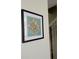 Framed artwork on wall near staircase with coat rack at 2348 Silver Palm, Kissimmee, FL 34747