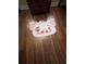 The bedroom has a cute Moana themed rug on the wood floor at 2348 Silver Palm, Kissimmee, FL 34747