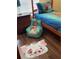 The bedroom has themed sheets, rug and even a beanbag chair at 2348 Silver Palm, Kissimmee, FL 34747