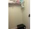 Walk-in closet features shelving, hanging space, and a secure safe for valuables at 2348 Silver Palm, Kissimmee, FL 34747