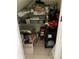 Storage closet stocked with household items, cleaning supplies, and organizers at 2348 Silver Palm, Kissimmee, FL 34747