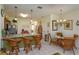 Open concept dining area with seating and a view into the kitchen at 2348 Silver Palm, Kissimmee, FL 34747