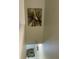 Hallway featuring tropical artwork and tile floors on the lower level at 2348 Silver Palm, Kissimmee, FL 34747