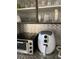 Modern kitchen appliances, including a sleek toaster oven and air fryer, against a stylish backsplash at 2348 Silver Palm, Kissimmee, FL 34747