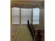 Bedroom with wooden bed frame and a large window offering plenty of natural light at 2348 Silver Palm, Kissimmee, FL 34747