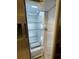 Clean and empty refrigerator with adjustable shelves and bright interior lighting at 2348 Silver Palm, Kissimmee, FL 34747