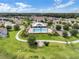 Sprawling community view from above featuring a pool and recreation center, all in pristine condition at 2411 Sabastian St, Mount Dora, FL 32757