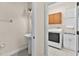 A charming half-bath connects to the laundry room featuring a pedestal sink and updated fixtures at 2411 Sabastian St, Mount Dora, FL 32757
