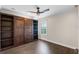 Multi-purpose bedroom with storage and built-in cabinets at 2411 Sabastian St, Mount Dora, FL 32757