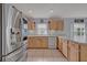 Functional kitchen featuring stainless steel appliances and ample counter space at 25057 Riverwalk Dr, Leesburg, FL 34748