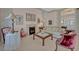 Bright living room showcases a fireplace, seating area, and neutral decor at 25057 Riverwalk Dr, Leesburg, FL 34748