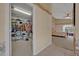 Large walk-in closet with ample shelving and clothing racks, providing substantial storage solutions at 25057 Riverwalk Dr, Leesburg, FL 34748