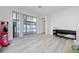 Spacious living area with sliding glass doors provides access to the outdoor patio at 2790 Monticello Way, Kissimmee, FL 34741