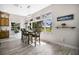 Bright dining area with large windows offering scenic views of the backyard at 3085 Vest Rd, St Cloud, FL 34772