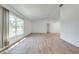 Spacious living room with abundant natural light, vaulted ceiling, and stylish flooring at 329 Drake Elm Dr, Kissimmee, FL 34743