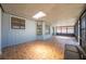 Enclosed patio with skylight windows and tile floors provides an ideal spot for relaxation and enjoying outdoor views at 329 Drake Elm Dr, Kissimmee, FL 34743