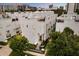 Modern multi-level townhouse showcasing sleek lines and rooftop terraces in a vibrant urban setting at 356 S Osceola Ave # 19, Orlando, FL 32801