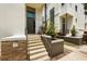 Modern townhome featuring a striking entrance, clean lines, and professional landscaping at 356 S Osceola Ave # 19, Orlando, FL 32801