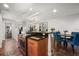 Open-concept kitchen with stainless steel appliances and stylish dining area at 356 S Osceola Ave # 19, Orlando, FL 32801