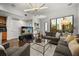 Relaxing living space featuring a cozy sofa, entertainment center, and modern accents at 356 S Osceola Ave # 19, Orlando, FL 32801