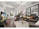 Comfortable living area with plush sofas, natural light, and stylish decor at 356 S Osceola Ave # 19, Orlando, FL 32801