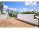 Private rooftop terrace featuring wood decking and views of the city skyline at 356 S Osceola Ave # 19, Orlando, FL 32801