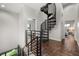 Interior view of modern staircase with black iron railing, leading to bedrooms at 356 S Osceola Ave # 19, Orlando, FL 32801