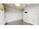 Bright room featuring neutral walls, closet and light gray flooring providing a versatile living space at 4002 Scarlet Branch Rd, Orlando, FL 32824