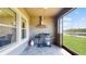 Outdoor patio with built in grill, exhaust hood and view of backyard at 4002 Scarlet Branch Rd, Orlando, FL 32824