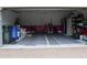 Spacious two car garage has ample storage capacity and carpeted floor at 411 Evening Sky Dr, Oviedo, FL 32765