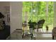 Living room with patio access, allowing light and nature to enter at 411 Evening Sky Dr, Oviedo, FL 32765