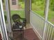 Cozy patio with seating overlooks a lush green space at 411 Evening Sky Dr, Oviedo, FL 32765