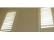 Window with white plantation shutters at 411 Evening Sky Dr, Oviedo, FL 32765