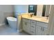 Elegant bathroom showcasing a soaking tub and dual sink vanity with quartz countertops at 4111 Sw 166Th Place Rd, Ocala, FL 34473