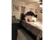 Comfortable bedroom with soft lighting, a plush bed, and stylish furnishings at 4251 Anthony Lane, Orlando, FL 32822