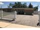 Charming single-story home with brick driveway and white picket fence at 4251 Anthony Lane, Orlando, FL 32822