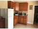Functional kitchenette with appliances and ample cabinet space at 4251 Anthony Lane, Orlando, FL 32822