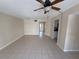 Bright, open living room featuring neutral walls and tile flooring at 4328 Aqua Vista Dr # B, Orlando, FL 32839