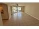 Bright living room with tile flooring and large windows at 4328 Aqua Vista Dr # B, Orlando, FL 32839