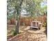 The backyard with wood fence and a small chicken coop at 513 Rachael Ct, Oviedo, FL 32765
