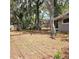 The spacious backyard features mature trees, offering shade and privacy at 513 Rachael Ct, Oviedo, FL 32765