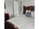 Bedroom features a queen bed and natural light at 513 Rachael Ct, Oviedo, FL 32765