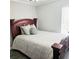 Bedroom features a queen bed and natural light at 513 Rachael Ct, Oviedo, FL 32765