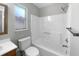 Clean bathroom featuring a shower-tub combo, white fixtures, and modern design at 52 Hydrangea Ln, Debary, FL 32713