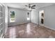 An empty bedroom with tile floors, closet, and a ceiling fan for ample air circulation at 52 Hydrangea Ln, Debary, FL 32713