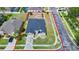 Aerial view of a home on a corner lot with a well-maintained lawn and landscaping at 5431 White Heron Pl, Oviedo, FL 32765