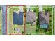 Overhead view of the property, highlighting its location between two homes and its proximity to a street at 5431 White Heron Pl, Oviedo, FL 32765