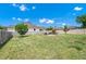 Spacious backyard with stone patio, perfect for entertaining, and a wooden privacy fence at 5431 White Heron Pl, Oviedo, FL 32765