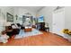 Bright living room features a decorative fireplace and sliding glass doors at 5431 White Heron Pl, Oviedo, FL 32765