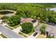 A delightful aerial view displays a residence nestled within a vibrant, verdant neighborhood at 555 Carey Way, Orlando, FL 32825
